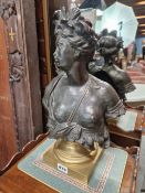 A PAIR OF 19th C. BRONZE FEMALE BUSTS REPRESENTING AMERICA AND AFRICA SUPPORTED ON GILT SOCLES AND