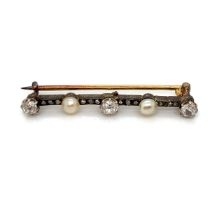 AN ANTIQUE OLD CUT DIAMOND AND PEARL BAR BROOCH. THE THREE PRINCIPLE OLD CUT DIAMONDS EACH