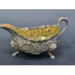 A SILVER TRIFID SAUCE BOAT WITH TWO SETS OF HALL MARKS, 200Gms.