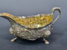 A SILVER TRIFID SAUCE BOAT WITH TWO SETS OF HALL MARKS, 200Gms.