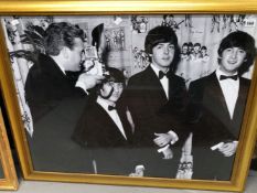 FRAMED PHOTOGRAPH OF THE BEATLES AT THE PREMIERE OF 'A HARD DAY'S NIGHT' 6 JULY 1964, THE