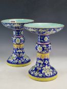 A PAIR OF 19th C. CHINESE BLUE GROUND GU SHAPED ALTAR VASES PAINTED WITH BANDS OF SCROLLING LOTUS,