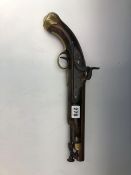 A TOWER ARMORY PERCUSSION CAP PISTOL WITH A BRASS TRIGGER GUARD, AN IRON RAMROD HINGED BELOW THE