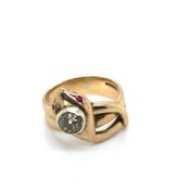 A VICTORIAN STYLE SYMBOLISM SERPENT RING. THE HEAD SET WITH RUBY EYES AND SURMOUNTED WITH A