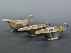 A PAIR AND ANOTHER HALLMARKED SILVER SAUCE BOAT, 232Gms.