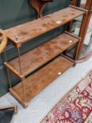 A 19th C. WALL UNIT OF THREE MAHOGANY SHELVES SUPPORTED ON BRASS RODS. W 68 x D 20 x H 57cms.