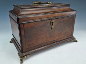 A GEORGE III EBONY LINE INLAID MAHOGANY THREE COMPARTMENT TEA CADDY WITH A SECRET COMPARTMENT TO ONE