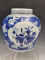 A CHINESE BLUE AND WHITE GINGER JAR AND COVER.