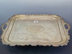 A HAMMERED SILVER TWO HANDLED RECTANGULAR TRAY BY WALKER AND HALL, SHEFFIELD 1928, INSCRIBED