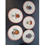 A SET OF FIVE LONGCHAMPS POTTERY BALLOONING PLATES TOGETHER WITH FOUR CELEBRATING WINES. Dia. 16cms.