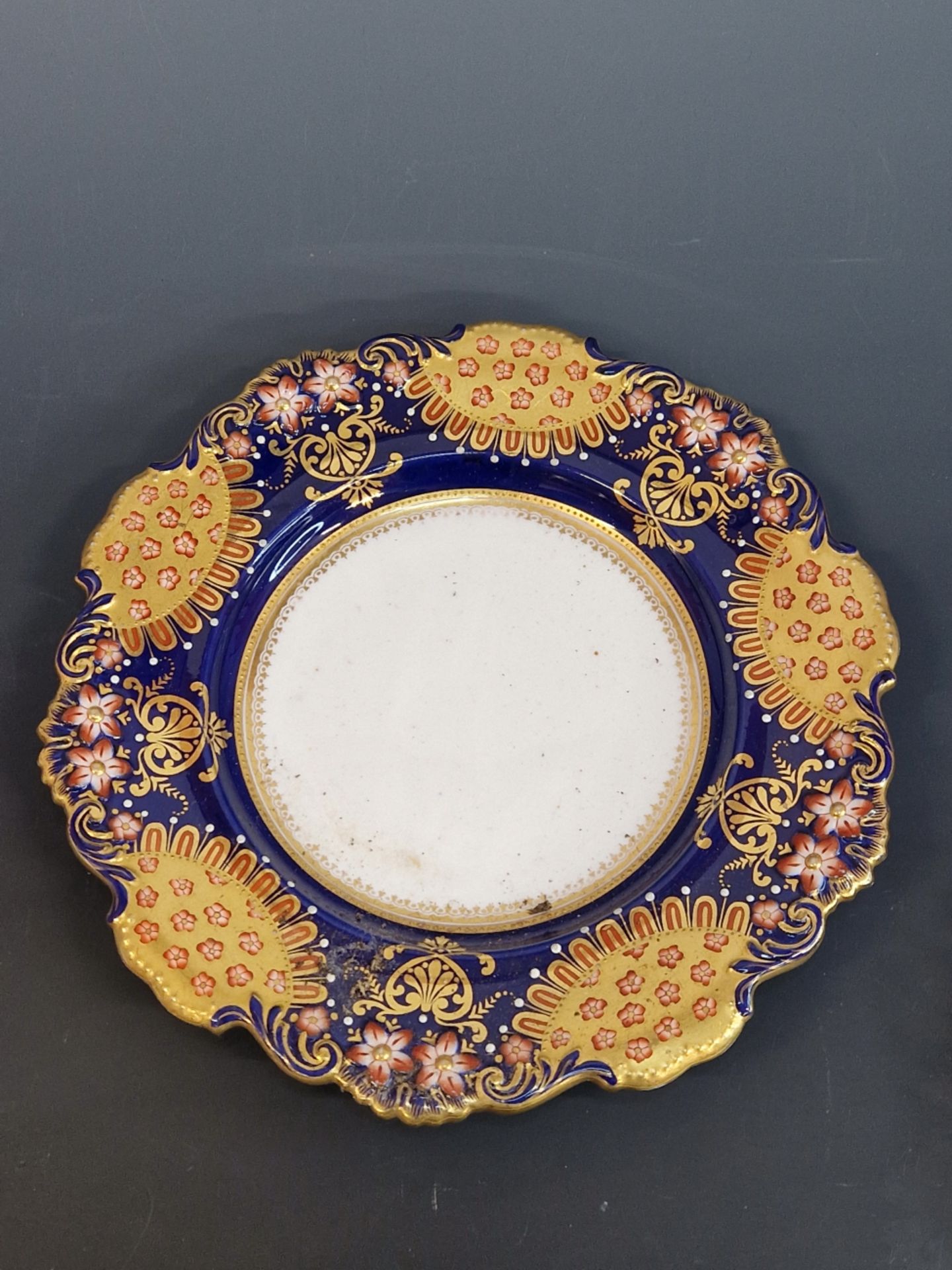 A COPELAND IMARI PALETTE PLATE TOGETHER WITH A CROWN DERBY PLATE GILT WITH A BRANCH OF BLOSSOM, - Image 4 of 5