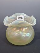A VINTAGE IRIDESCENT GLASS VASE WITH SHAPED OPAQUE RIM. GROUND PONTIL TO BASE. 10.5 cm HIGH.