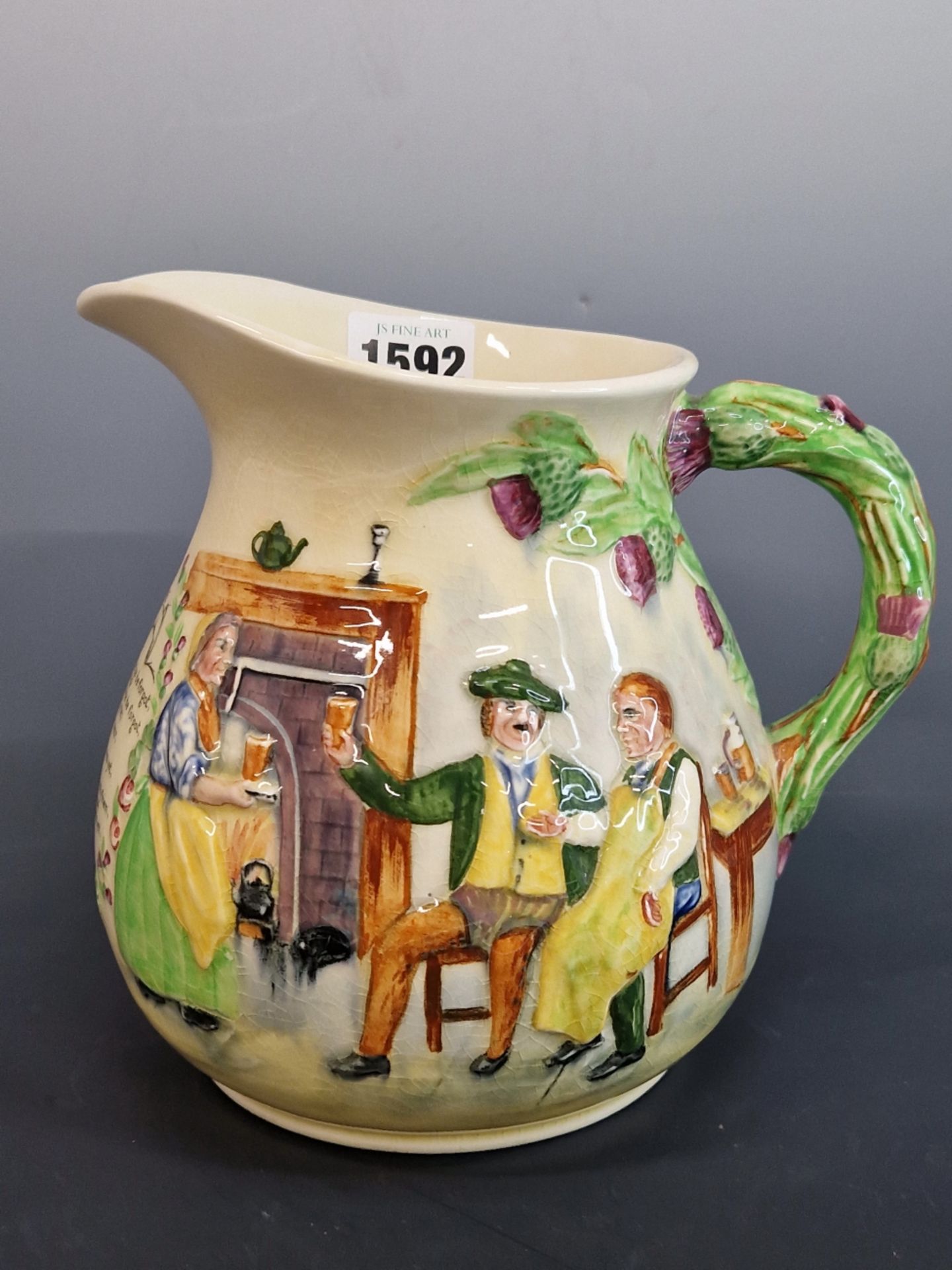 A CROWN DEVON -FIELDINGS AULD LANG SYNE POTTERY JUG WITH MUSICAL MOVEMENT TO THE BASE., 17.5 cm