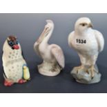 A LOMONOSOV PORCELAIN PENGUIN, A PELICAN AND A HAWK