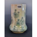 A RUSKIN YELLOW GROUND VASE DATED 1913 AND PAINTED WITH GREEN STEMS OF DAISY LIKE FLOWERS. H 21cms.