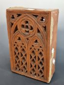 A DECORATIVE BRICK BY PLATTS PIERCED ON ONE SIDE WITH A GOTHIC WINDOW. H 26cms.