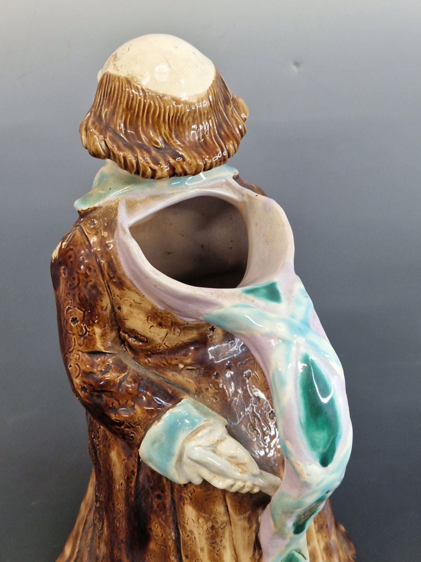 ATTRIBUTED TO SARREGUEMINES, A MAJOLICA JUG MODELLED AS A GENTLEMAN WEARING A TURQUOISE TRIMMED - Image 3 of 5