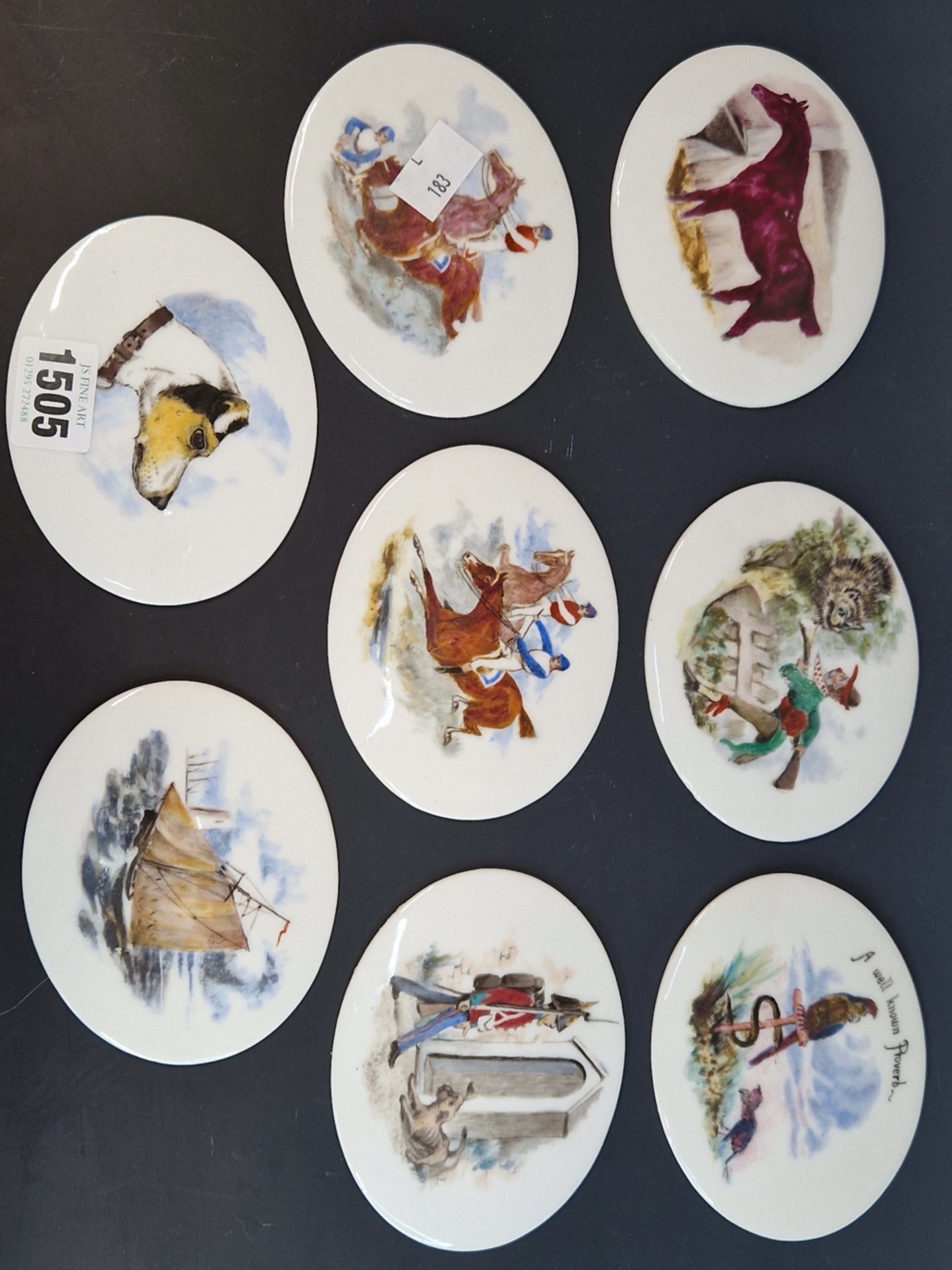 A SET OF EIGHT EUROPEAN PORCELAIN OVAL PLAQUES DECORATED WITH HORSES, FABLES, YACHTS AND DOGS. W