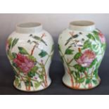 A PAIR OF 19TH CENTURY CHINESE BALUSTER VASES PAINTED BIRDS AMONGST PINK PEONIES 36 cm HIGH