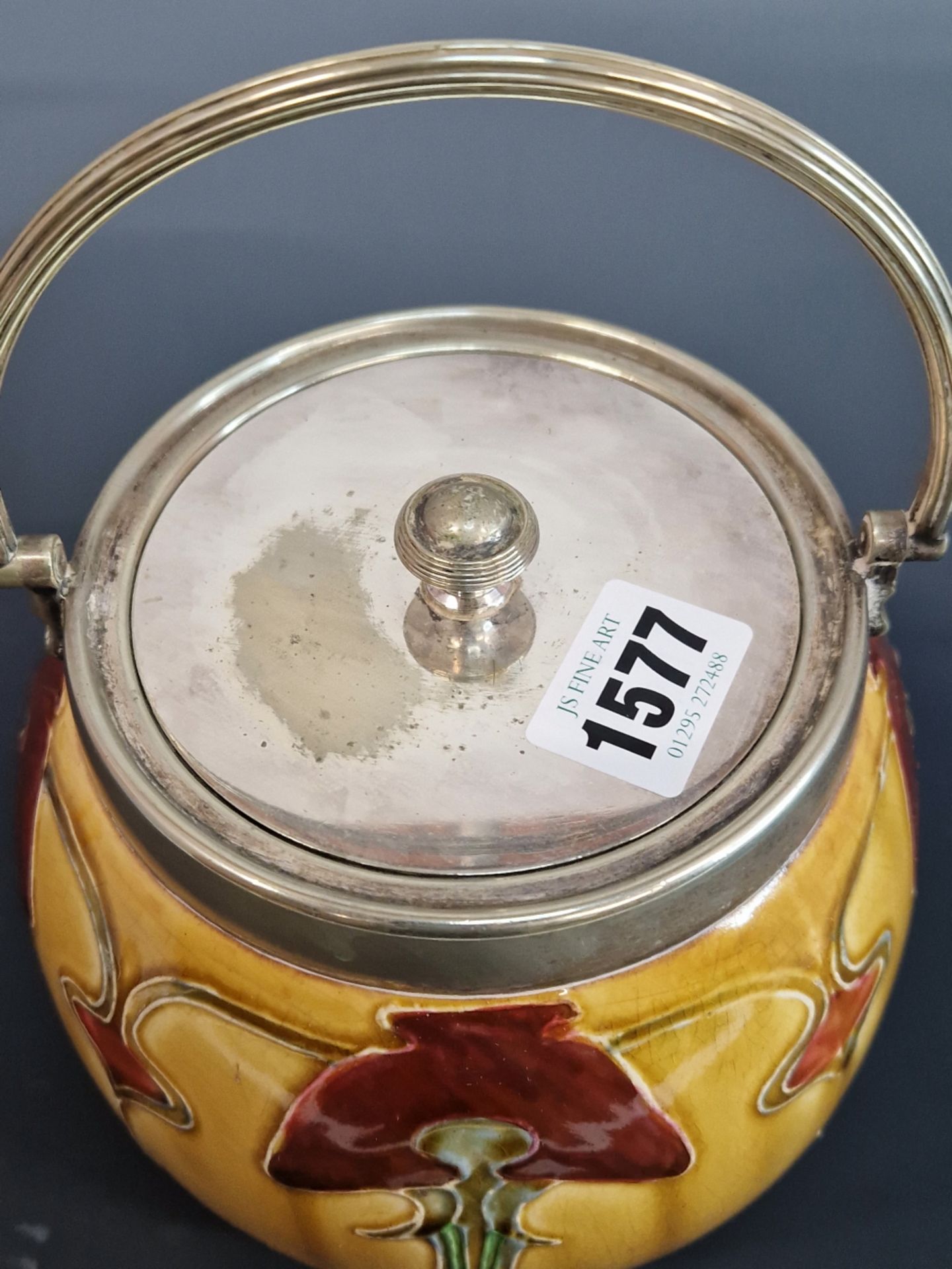 DOULTON?- AN ART NOUVEAU BISCUIT BARREL WITH SILVER PLATED MOUNTS. YELLOW GROUND BODY WITH - Image 2 of 3