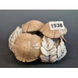 A BING AND GRONDAHL, COPENHAGEN PORCELAIN GROUP OF FUNGI GROWING AMONGST BRACKEN. W 14cms.