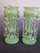 A PAIR OF 19th C. MISTED GREEN GLASS LUSTRES, THE PETAL EDGED TOPS GILT WITH KEY FRET BANDS ABOVE CL
