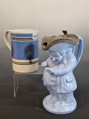 ATTRIBUTED TO ALCOCKS, A BLUE POTTERY SNUFF TAKER TOBY JUG TOGETHER WITH A MOCHA WARE QUART MUG