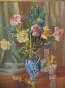 MONTAGUE LEDER (1897-1976) ARR, A VASE OF FLOWERS BY A PORCELAIN FIGURE, OIL ON BOARD, SIGNED