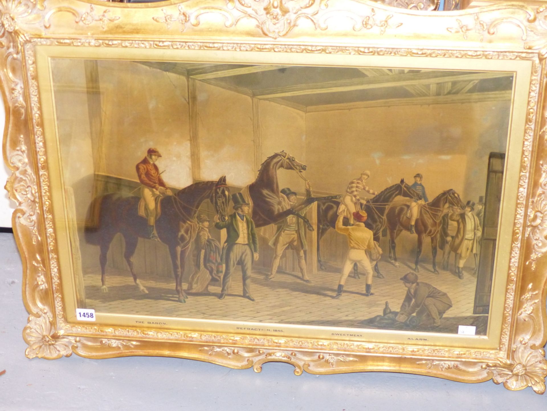 AN ANTIQUE COLOUR PRINT OF RACE HORSES IN A STABLE IN AN IMPRESSIVE GILT FRAME. 65 x 88cms - Image 2 of 11