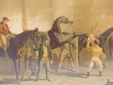 AN ANTIQUE COLOUR PRINT OF RACE HORSES IN A STABLE IN AN IMPRESSIVE GILT FRAME. 65 x 88cms