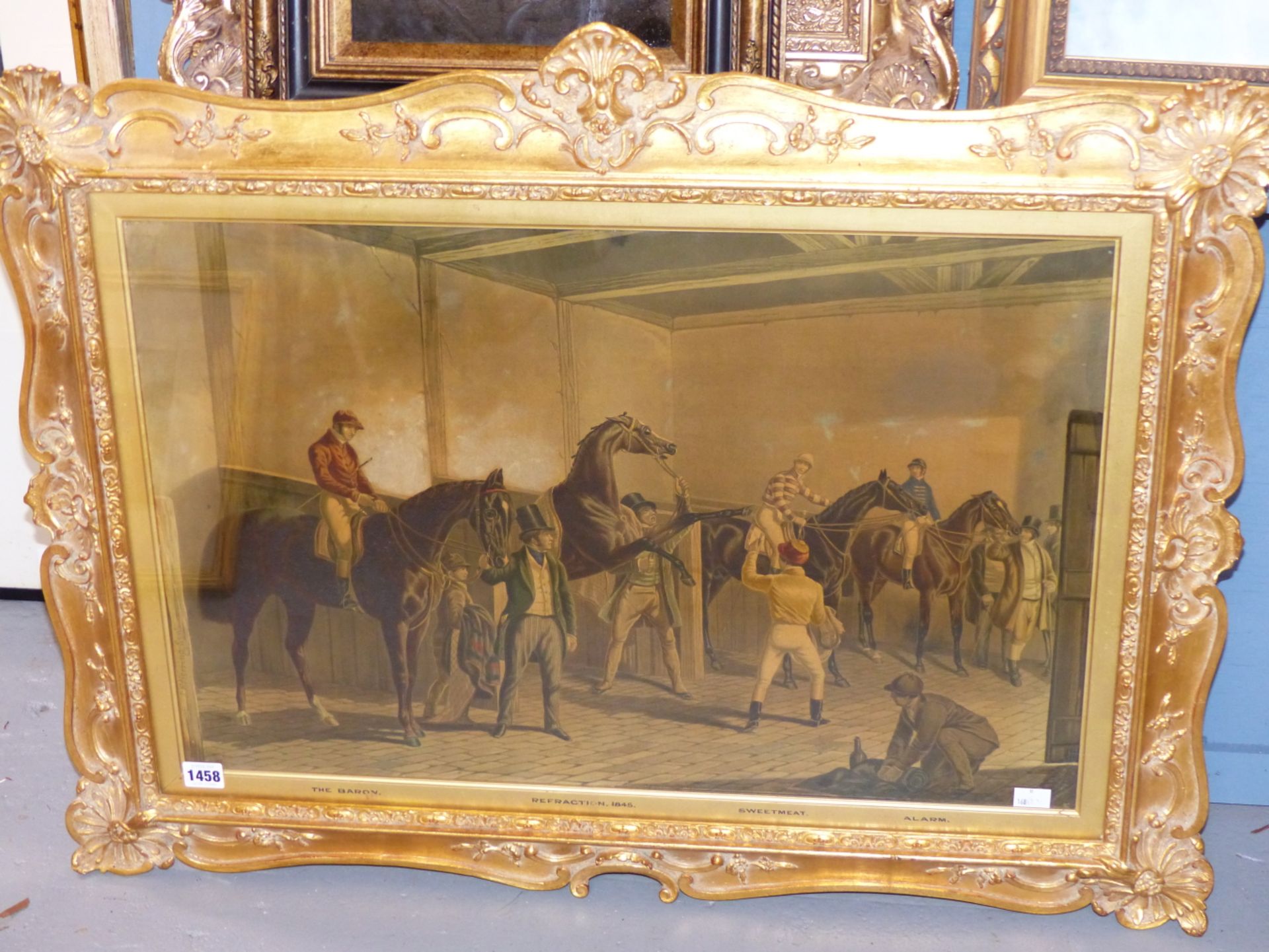 AN ANTIQUE COLOUR PRINT OF RACE HORSES IN A STABLE IN AN IMPRESSIVE GILT FRAME. 65 x 88cms - Image 3 of 11