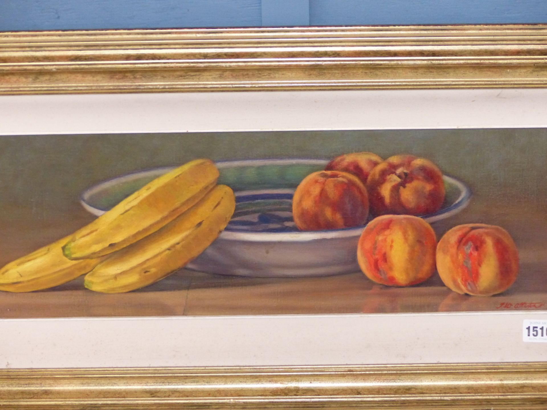 J. MACALLISTER (20th C. SCHOOL) ARR. A TABLE TOP STILL LIFE OF FRUIT, OIL ON BOARD. 21 x 60cms