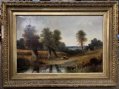 L. Barry (British, 20th century), staffage in a landscape, oil on canvas,19x29.5ins signed, framed