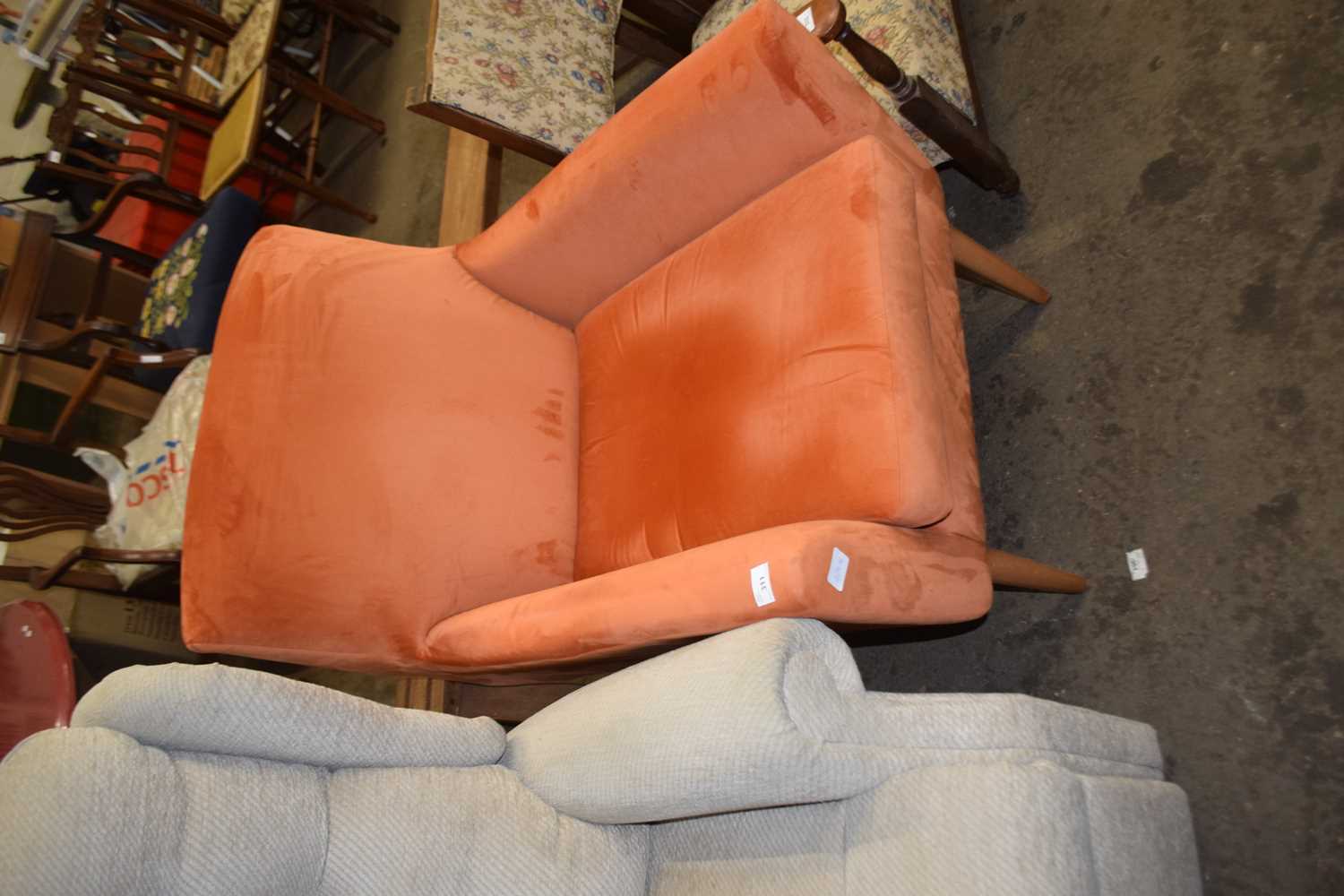 Further armchair with orange draylon covering
