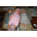 Group of three modern dolls