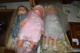 Group of three modern dolls