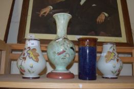 Quantity of painted glass vases and a cylindrical pottery vase