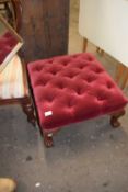 Georgian style button upholstered foot stool with ball and claw feet