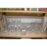 Quantity of various assorted clear drinking glasses