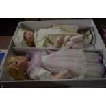 Box containing two porcelain dolls from the Leonardo collection with certificate