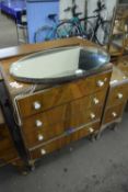 Walnut veneered dressing table with triple mirrored back together with matching chest of drawers and