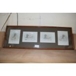 Group of four framed photographs of babies