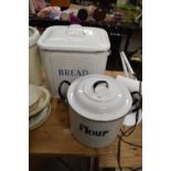 Two metal bins, one for bread the other for flour
