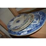 Blue and white printed meat plate and two other plates