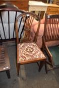 Single mahogany dining chair with floral upholstered seat