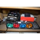 Group of coloured lights and vintage car cassette player