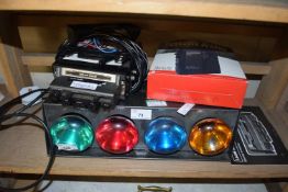 Group of coloured lights and vintage car cassette player