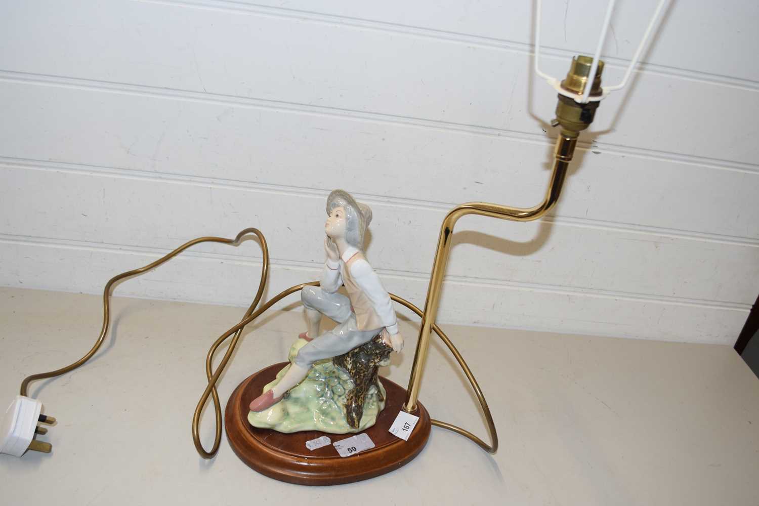 Modern table lamp with figural base