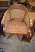 Hardwood and rattan revolving desk chair