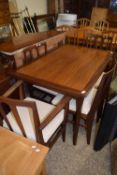 Retro mid Century extending dining table and five chairs, probably G-Plan